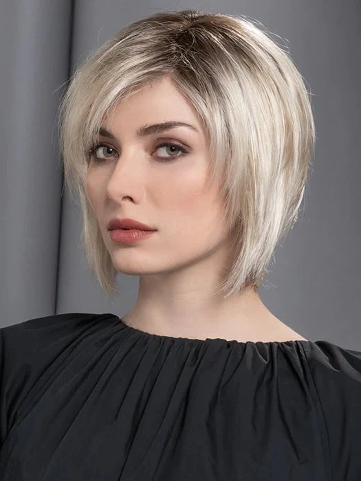 13625-ava-synthetic-lace-front-wig-mono-part-1.webp Ava | Synthetic Lace Front Wig (Mono Part)