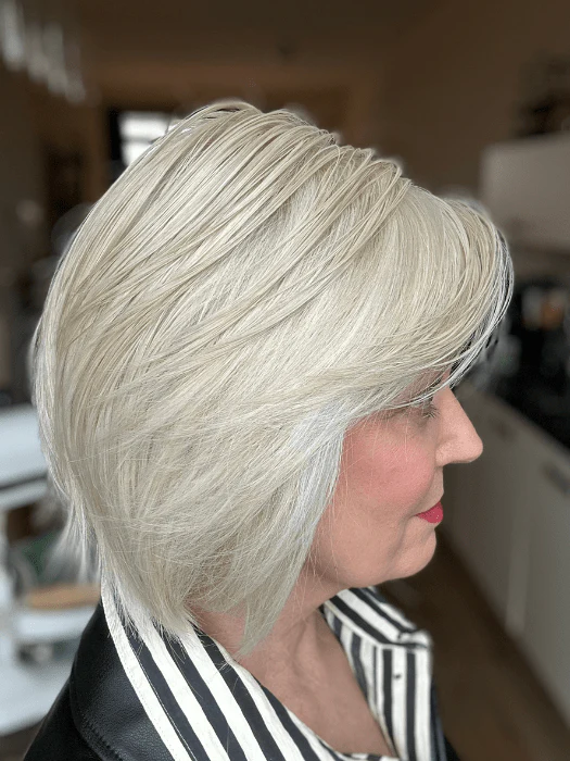 26205-real-deal-synthetic-lace-front-wig-mono-top-3.webp Real Deal | Synthetic Lace Front Wig (Mono Top)